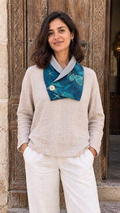 Cozy Collar – teal cyanotype collar with starfish print and yellow hand embroidery, worn over a linen top, by MIM Creative Wear, Egypt